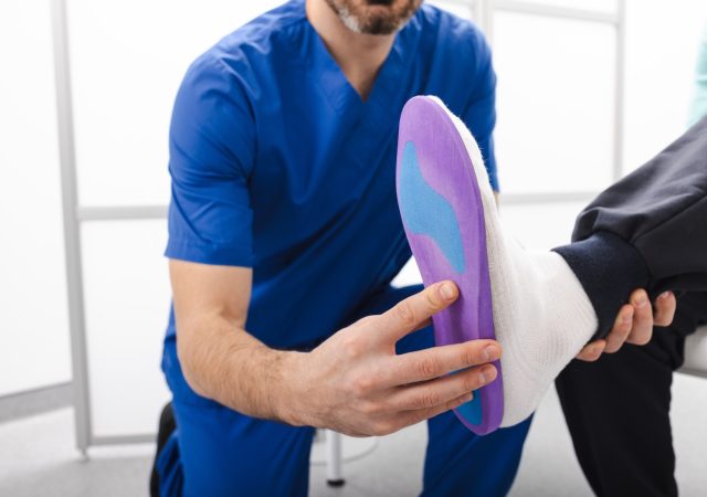 Orthopedist fitting individual orthopedic insole for patient foot. Orthopedic insoles SSUCv3H4sIAAAAAAAACpxTy47cIBC8R8o/jDgHyRhsw/5KlEPzmDFaxlgG72o1mn9f/GAWT1Y55GDJXd1UF93F7eeP0wlJCFahl9NtiVJsnZtDnCBaPyS4+rXjkxm0mUrkbaJtVQJgy8hoG/1kwZWghKj6Aa4mgcPs3ALf1yQKEeIcTCi0gIPrR4rpgzOMZRj6OUYzhejVa4mD9tL8hUp7WbGx99EviaK5gmguSe2hfR7N7y0+5cSaTCdSCqGdfdMzyxXL0Eb+Xye3nz+PG13MoJZR3O6F6sk4A9vIdo2oaaDVFQHMmpZhpqnGHNozhoowTptanKXJnVGnQIKSCnMDFLMKOgyNoFhRw5gkteQdXyVtOtDre5r2dR3RrgBmbX0xsjevwIWn4YIdYYLDuXGyyg6XAvGxX+2VmZSfhzh9lJNCzvsRpFvMc05tTMZ7CCGV64yXi01m9teiz+DjOrCdFem0+SUklHLWcs5IU5GOCMJQ6cveJp5VThY4j86DNkvTx3afHUk6VtWEClY/ln00Zy5o2ZbPjlkMcbWJ6kifHwTpqOBECNJ+8W5v47vMt6KW75+ijgXPj+erZhd+eMmp0Opy33a5B+L03BmjJZZadpiJrsYgJMVt29YdMCK4UMlv908AAAD//wMAXApfEZoEAAA=